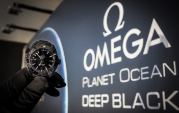 Omega Planet Ocean Deep Black Header