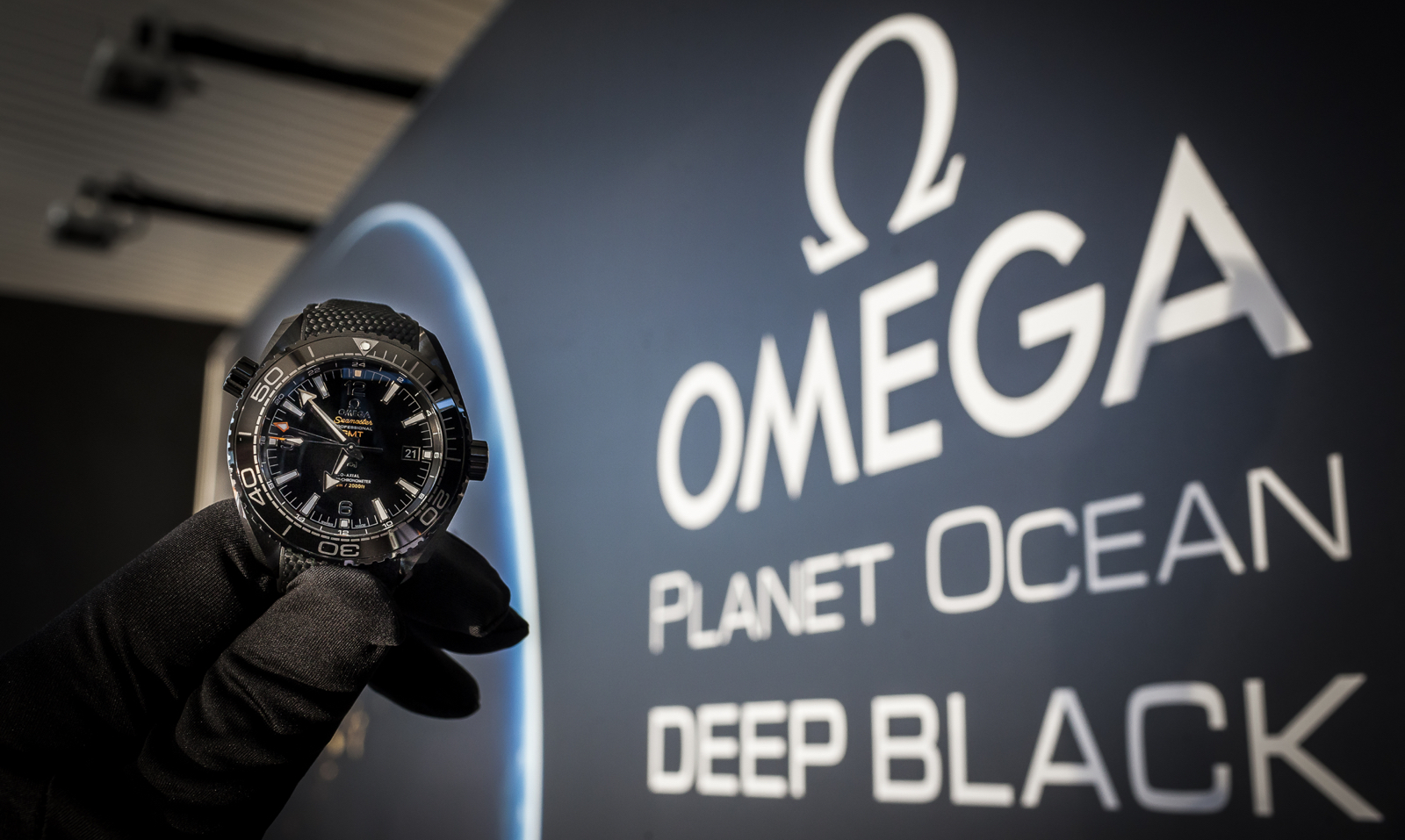 Omega Planet Ocean Deep Black Header